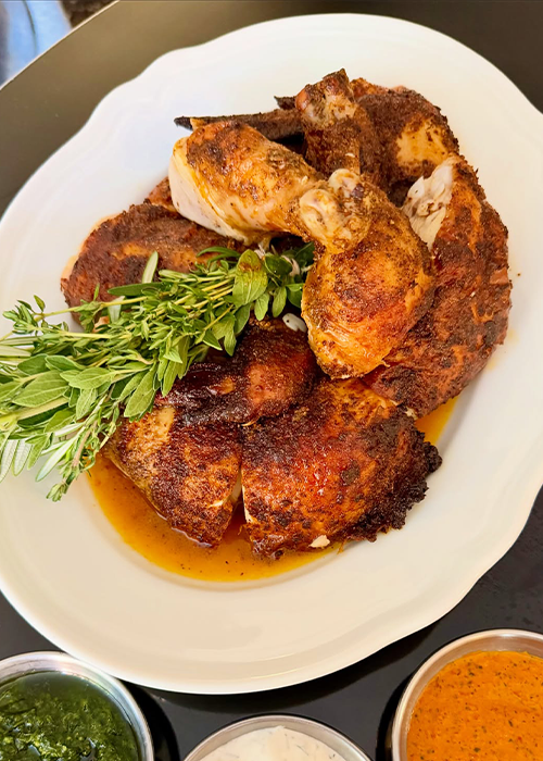 At Cleo, pair the roast chicken with a chilled red.