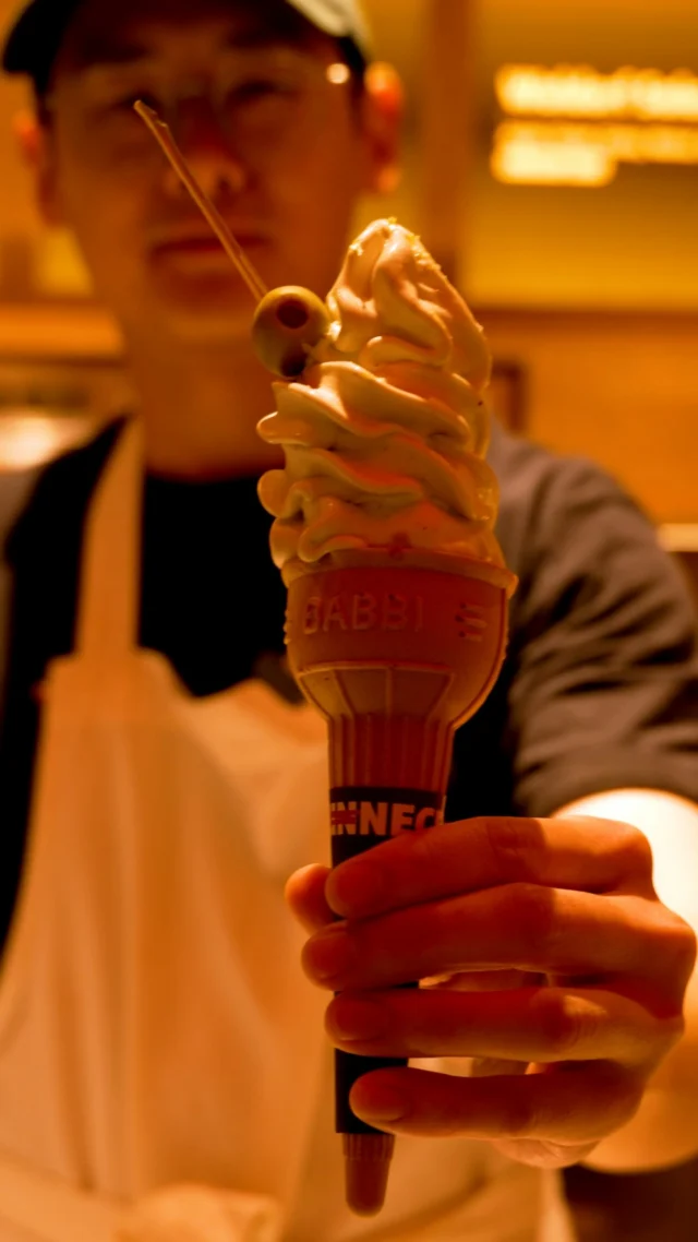 No, this is not just boozy ice cream. We tried the Dirty Martini soft serve at Unnecessary — the new concept from the team behind Double Chicken Please — and it delivers on its promise of a perfectly balanced cocktail in ice cream form. So how do they translate Dirty Martini flavors into a frozen treat? That’s what we’re here to find out.